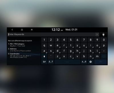 Screenshot of the Hyundai navigation system with a keyboard and input field displayed on the screen.